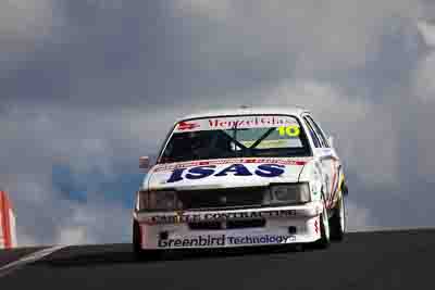 10;10;23-April-2011;Australia;Bathurst;Bathurst-Motor-Festival;Bruce-Panting;Commodore-Cup;Geoff-Cowie;Holden-Commodore-VH;Mt-Panorama;NSW;New-South-Wales;auto;motorsport;racing;super-telephoto