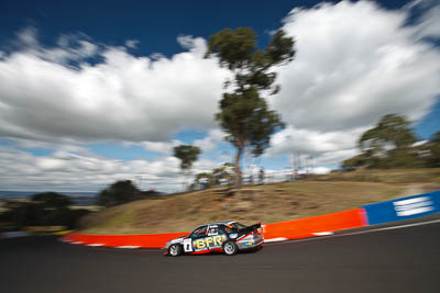 8;23-April-2011;8;Australia;Bathurst;Bathurst-Motor-Festival;Commodore-Cup;Garry-Mennell;Holden-Commodore-VS;Mt-Panorama;NSW;New-South-Wales;Steve-Briffa;auto;clouds;motorsport;racing;sky;wide-angle