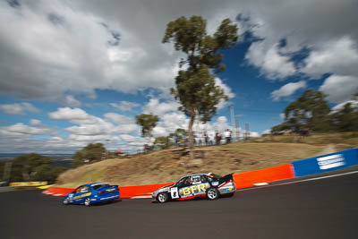 8;23-April-2011;8;Australia;Bathurst;Bathurst-Motor-Festival;Commodore-Cup;Garry-Mennell;Holden-Commodore-VS;Mt-Panorama;NSW;New-South-Wales;Steve-Briffa;auto;clouds;motorsport;racing;sky;wide-angle