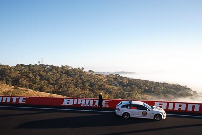 24-April-2011;28mm;Australia;BH95CG;Bathurst;Bathurst-Motor-Festival;Course-Car;Holden-Commodore-VE-Sportwagon;Mt-Panorama;NSW;New-South-Wales;atmosphere;auto;marshal;motorsport;officials;racing;wide-angle