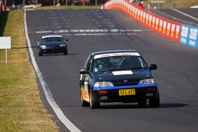 40;1990-Suzuki-Swift-GTI;24-April-2011;40;Australia;Bathurst;Bathurst-Motor-Festival;John-Crowe;Mt-Panorama;NSW;NSW-Road-Racing-Club;New-South-Wales;Regularity;auto;motorsport;racing;super-telephoto