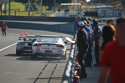 135;42;24-April-2011;Australia;Bathurst;Bathurst-Motor-Festival;Geoff-Morgan;Lotus-Elise-HPE;Mazda-RX‒7;Mazda-RX7;Mt-Panorama;NSW;New-South-Wales;Production-Sports-Cars;Ric-Shaw;Simon-Hogg;atmosphere;auto;motorsport;pitlane;racing