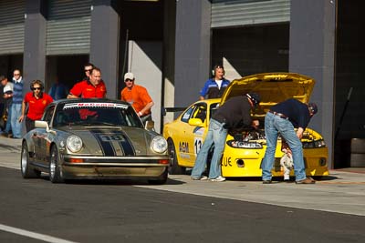 18;24-April-2011;Australia;Bathurst;Bathurst-Motor-Festival;Mt-Panorama;NSW;New-South-Wales;Porsche-911-Carrera;Production-Sports-Cars;Stephen-Borness;atmosphere;auto;motorsport;pitlane;racing