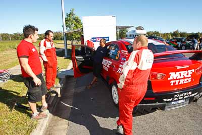 3;13-May-2011;3;APRC;Asia-Pacific-Rally-Championship;Australia;Caloundra;Gaurav-Gill;Glen-Macneall;IROQ;International-Rally-Of-Queensland;Mitsubishi-Lancer-Evolution-X;QLD;Queensland;Sunshine-Coast;Team-MRF;Wayne-Moore;auto;crew;mechanics;motorsport;racing;shakedown;team;wide-angle