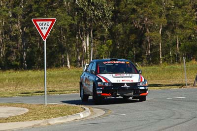 21;13-May-2011;21;ARC;Australia;Australian-Rally-Championship;Caloundra;IROQ;International-Rally-Of-Queensland;Lee-Tierney;Mark-Pedder;Mitsubishi-Lancer-Evolution-IX;Pedders-Suspension;QLD;Queensland;Sunshine-Coast;auto;motorsport;racing;shakedown;telephoto