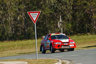 31;13-May-2011;31;ARC;Australia;Australian-Rally-Championship;Caitlin-Earley;Caloundra;IROQ;International-Rally-Of-Queensland;Michael-Bailey;Mitsubishi-Lancer-Evolution-IV;QLD;Queensland;Sunshine-Coast;auto;motorsport;racing;shakedown;telephoto