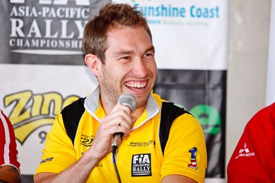 13-May-2011;APRC;Asia-Pacific-Rally-Championship;Australia;Caloundra;Chris-Atkinson;IROQ;International-Rally-Of-Queensland;Proton;QLD;Queensland;Sunshine-Coast;Topshot;auto;interview;motorsport;portrait;press-conference;racing;shakedown;smile;telephoto