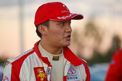 13-May-2011;APRC;Asia-Pacific-Rally-Championship;Australia;Caloundra;Hao-Yuan;IROQ;International-Rally-Of-Queensland;QLD;Queensland;Sunshine-Coast;auto;motorsport;portrait;racing;telephoto;twilight