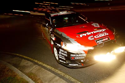 6;13-May-2011;6;APRC;Asia-Pacific-Rally-Championship;Australia;Caloundra;IROQ;International-Rally-Of-Queensland;Mitsubishi-Lancer-Evolution-IX;Pertamina-Cusco-Racing;QLD;Queensland;Rifat-Sungkar;Scott-Beckwith;Sunshine-Coast;auto;motorsport;night;racing;wide-angle