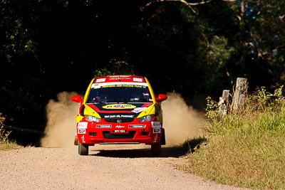 17;14-May-2011;17;APRC;Asia-Pacific-Rally-Championship;Australia;Gunaseelan-Rajoo;IROQ;Imbil;International-Rally-Of-Queensland;Jagdev-Singh;Pennzoil-GSR-Racing-Team;Proton-Satria-Neo;QLD;Queensland;Sunshine-Coast;auto;motorsport;racing;super-telephoto