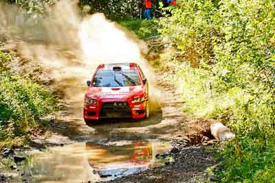 1;1;14-May-2011;APRC;Asia-Pacific-Rally-Championship;Australia;IROQ;Imbil;International-Rally-Of-Queensland;Katsu-Taguchi;Mark-Stacey;Mitsubishi-Lancer-Evolution-X;QLD;Queensland;Sunshine-Coast;Team-MRF;auto;motorsport;racing;telephoto;water-splash