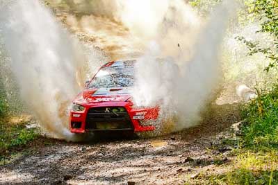 1;1;14-May-2011;APRC;Asia-Pacific-Rally-Championship;Australia;IROQ;Imbil;International-Rally-Of-Queensland;Katsu-Taguchi;Mark-Stacey;Mitsubishi-Lancer-Evolution-X;QLD;Queensland;Sunshine-Coast;Team-MRF;auto;motorsport;racing;telephoto;water-splash