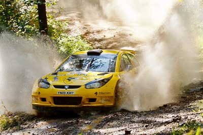 4;14-May-2011;4;APRC;Alister-McRae;Asia-Pacific-Rally-Championship;Australia;Bill-Hayes;IROQ;Imbil;International-Rally-Of-Queensland;Proton-Motorsports;Proton-Satria-Neo-S2000;QLD;Queensland;Sunshine-Coast;auto;motorsport;racing;telephoto;water-splash