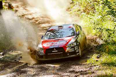 6;14-May-2011;6;APRC;Asia-Pacific-Rally-Championship;Australia;IROQ;Imbil;International-Rally-Of-Queensland;Mitsubishi-Lancer-Evolution-IX;Pertamina-Cusco-Racing;QLD;Queensland;Rifat-Sungkar;Scott-Beckwith;Sunshine-Coast;auto;motorsport;racing;telephoto;water-splash