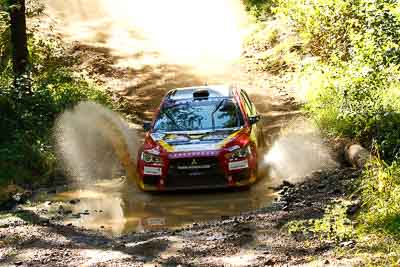 11;11;14-May-2011;APRC;Asia-Pacific-Rally-Championship;Australia;Fan-Fan;IROQ;Imbil;International-Rally-Of-Queensland;Junwei-Fang;QLD;Queensland;Soueast-Motor-Kumho-Team;Sunshine-Coast;auto;motorsport;racing;telephoto;water-splash