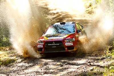 11;11;14-May-2011;APRC;Asia-Pacific-Rally-Championship;Australia;Fan-Fan;IROQ;Imbil;International-Rally-Of-Queensland;Junwei-Fang;QLD;Queensland;Soueast-Motor-Kumho-Team;Sunshine-Coast;auto;motorsport;racing;telephoto;water-splash