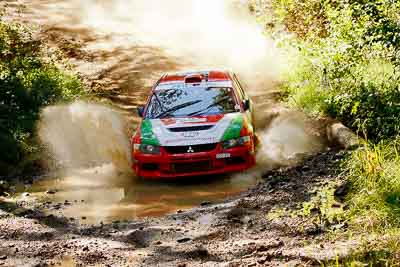 12;12;14-May-2011;APRC;Asia-Pacific-Rally-Championship;Australia;Bosowa-Rally-Team;Hade-Mboi;IROQ;Imbil;International-Rally-Of-Queensland;Mitsubishi-Lancer-Evolution-IX;QLD;Queensland;Subhan-Aksa;Sunshine-Coast;auto;motorsport;racing;telephoto;water-splash