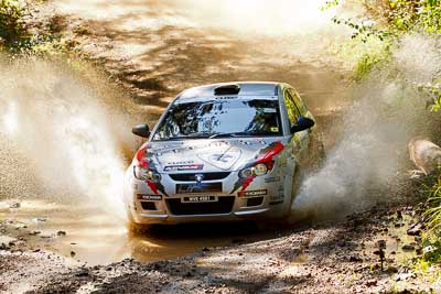 15;14-May-2011;APRC;Asia-Pacific-Rally-Championship;Australia;IROQ;Imbil;International-Rally-Of-Queensland;Karamjit-Singh;Proton-Cusco-Rally-Team;Proton-Satria-Neo;QLD;Queensland;Sunshine-Coast;Vivek-Ponnusamy;auto;motorsport;racing;telephoto;water-splash