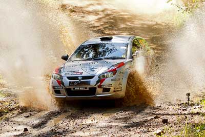 15;14-May-2011;APRC;Asia-Pacific-Rally-Championship;Australia;IROQ;Imbil;International-Rally-Of-Queensland;Karamjit-Singh;Proton-Cusco-Rally-Team;Proton-Satria-Neo;QLD;Queensland;Sunshine-Coast;Vivek-Ponnusamy;auto;motorsport;racing;telephoto;water-splash