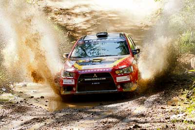 13;13;14-May-2011;APRC;Asia-Pacific-Rally-Championship;Australia;Hao-Yuan;Hongyu-Pan;IROQ;Imbil;International-Rally-Of-Queensland;Mitsubishi-Lancer-Evolution-X;QLD;Queensland;Soueast-Motor-Kumho-Team;Sunshine-Coast;auto;motorsport;racing;telephoto;water-splash