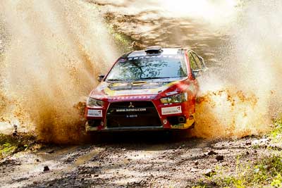 13;13;14-May-2011;APRC;Asia-Pacific-Rally-Championship;Australia;Hao-Yuan;Hongyu-Pan;IROQ;Imbil;International-Rally-Of-Queensland;Mitsubishi-Lancer-Evolution-X;QLD;Queensland;Soueast-Motor-Kumho-Team;Sunshine-Coast;auto;motorsport;racing;telephoto;water-splash