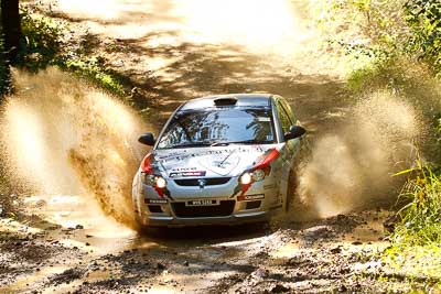 16;14-May-2011;16;APRC;Akira-Bamba;Asia-Pacific-Rally-Championship;Australia;IROQ;Imbil;International-Rally-Of-Queensland;Proton-Cusco-Rally-Team;Proton-Satria-Neo;QLD;Queensland;Sunshine-Coast;Takahiro-Yasui;auto;motorsport;racing;telephoto;water-splash