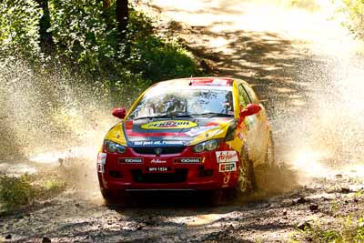 17;14-May-2011;17;APRC;Asia-Pacific-Rally-Championship;Australia;Gunaseelan-Rajoo;IROQ;Imbil;International-Rally-Of-Queensland;Jagdev-Singh;Pennzoil-GSR-Racing-Team;Proton-Satria-Neo;QLD;Queensland;Sunshine-Coast;auto;motorsport;racing;telephoto;water-splash