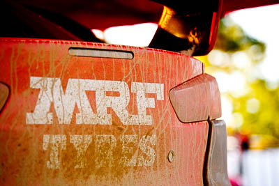 14-May-2011;APRC;Asia-Pacific-Rally-Championship;Australia;IROQ;Imbil;International-Rally-Of-Queensland;MRF-Tyres;QLD;Queensland;Sunshine-Coast;Team-MRF;auto;brand;close‒up;detail;dirt;logo;motorsport;racing;service-park;telephoto