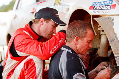 14-May-2011;ARC;Australia;Australian-Rally-Championship;IROQ;Imbil;International-Rally-Of-Queensland;QLD;Queensland;Ryan-Smart;Smart-Motorsport;Sunshine-Coast;Topshot;Toyota-Corolla-Sportivo;auto;crew;mechanic;motorsport;portrait;racing;repair;service-park;team;telephoto;twilight