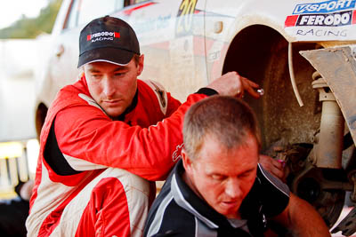 14-May-2011;ARC;Australia;Australian-Rally-Championship;IROQ;Imbil;International-Rally-Of-Queensland;QLD;Queensland;Ryan-Smart;Smart-Motorsport;Sunshine-Coast;Toyota-Corolla-Sportivo;auto;crew;mechanic;motorsport;portrait;racing;repair;service-park;team;telephoto;twilight