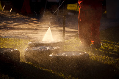 14-May-2011;APRC;Asia-Pacific-Rally-Championship;Australia;IROQ;Imbil;International-Rally-Of-Queensland;QLD;Queensland;Soueast-Motor-Kumho-Team;Sunshine-Coast;afternoon;auto;detail;motorsport;racing;service-park;telephoto;tyres;water-spray