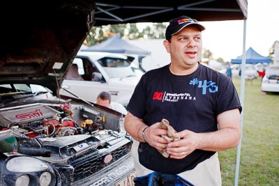 14-May-2011;28mm;ARC;Australia;Australian-Rally-Championship;DSA-Motorsport;Driver-Skills-Australia;IROQ;Imbil;International-Rally-Of-Queensland;Mark-Butcher;QLD;Queensland;Sunshine-Coast;auto;motorsport;portrait;racing;repair;service-park;wide-angle