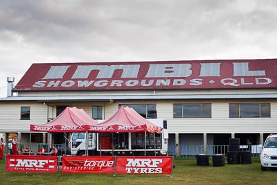 15-May-2011;50mm;APRC;Asia-Pacific-Rally-Championship;Australia;IROQ;Imbil;International-Rally-Of-Queensland;QLD;Queensland;Sunshine-Coast;Team-MRF;auto;building;clouds;crew;detail;motorsport;racing;service-park;sky;team