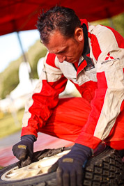 15-May-2011;50mm;APRC;Asia-Pacific-Rally-Championship;Australia;IROQ;Imbil;International-Rally-Of-Queensland;QLD;Queensland;Soueast-Motor-Kumho-Team;Sunshine-Coast;Team-MRF;auto;cleaning;detail;mechanic;motorsport;portrait;racing;service-park;tyres;wheel