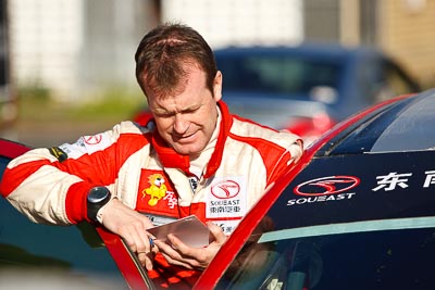 15-May-2011;APRC;Asia-Pacific-Rally-Championship;Australia;IROQ;Ieuan-Thomas;Imbil;International-Rally-Of-Queensland;QLD;Queensland;Sunshine-Coast;auto;motorsport;portrait;racing;service-park;telephoto