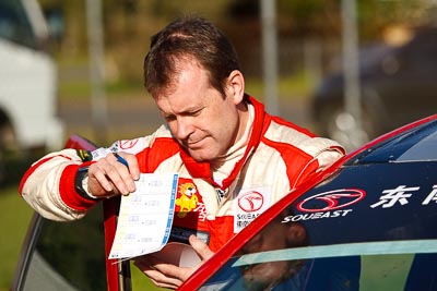 15-May-2011;APRC;Asia-Pacific-Rally-Championship;Australia;IROQ;Ieuan-Thomas;Imbil;International-Rally-Of-Queensland;QLD;Queensland;Sunshine-Coast;auto;motorsport;portrait;racing;service-park;telephoto