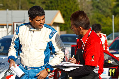 15-May-2011;APRC;Asia-Pacific-Rally-Championship;Australia;Cusco;IROQ;Imbil;International-Rally-Of-Queensland;QLD;Queensland;Sunshine-Coast;Vivek-Ponnusamy;auto;mechanic;motorsport;portrait;racing;service-park;telephoto