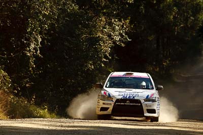 18;15-May-2011;APRC;Akiko-Nakagawa;Asia-Pacific-Rally-Championship;Atsushi-Masumura;Australia;IROQ;Imbil;International-Rally-Of-Queensland;Mitsubishi-Lancer-Evolution-X;QLD;Queensland;Sunshine-Coast;Super-Alex-Troop;auto;motorsport;racing;special-stage;telephoto