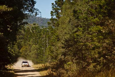 21;15-May-2011;21;ARC;Australia;Australian-Rally-Championship;IROQ;Imbil;International-Rally-Of-Queensland;Lee-Tierney;Mark-Pedder;Mitsubishi-Lancer-Evolution-IX;Pedders-Suspension;QLD;Queensland;Sunshine-Coast;auto;motorsport;racing;special-stage;telephoto