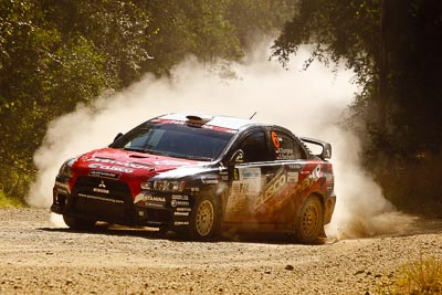 6;15-May-2011;6;APRC;Asia-Pacific-Rally-Championship;Australia;IROQ;Imbil;International-Rally-Of-Queensland;Mitsubishi-Lancer-Evolution-IX;Pertamina-Cusco-Racing;QLD;Queensland;Rifat-Sungkar;Scott-Beckwith;Sunshine-Coast;auto;motorsport;racing;special-stage;telephoto