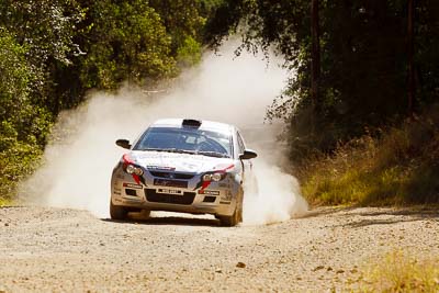 15;15-May-2011;APRC;Asia-Pacific-Rally-Championship;Australia;IROQ;Imbil;International-Rally-Of-Queensland;Karamjit-Singh;Proton-Cusco-Rally-Team;Proton-Satria-Neo;QLD;Queensland;Sunshine-Coast;Vivek-Ponnusamy;auto;motorsport;racing;special-stage;telephoto