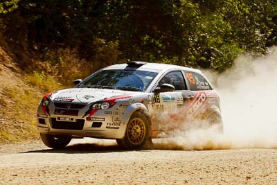 15;15-May-2011;APRC;Asia-Pacific-Rally-Championship;Australia;IROQ;Imbil;International-Rally-Of-Queensland;Karamjit-Singh;Proton-Cusco-Rally-Team;Proton-Satria-Neo;QLD;Queensland;Sunshine-Coast;Vivek-Ponnusamy;auto;motorsport;racing;special-stage;telephoto