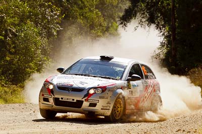 16;15-May-2011;16;APRC;Akira-Bamba;Asia-Pacific-Rally-Championship;Australia;IROQ;Imbil;International-Rally-Of-Queensland;Proton-Cusco-Rally-Team;Proton-Satria-Neo;QLD;Queensland;Sunshine-Coast;Takahiro-Yasui;auto;motorsport;racing;special-stage;telephoto