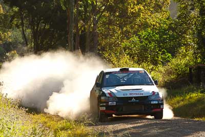 21;15-May-2011;21;ARC;Australia;Australian-Rally-Championship;IROQ;Imbil;International-Rally-Of-Queensland;Lee-Tierney;Mark-Pedder;Mitsubishi-Lancer-Evolution-IX;Pedders-Suspension;QLD;Queensland;Sunshine-Coast;auto;motorsport;racing;special-stage;telephoto