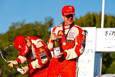 15-May-2011;2011-International-Rally-Of-Queensland;APRC;Asia-Pacific-Rally-Championship;Australia;IROQ;Ieuan-Thomas;Imbil;International-Rally-Of-Queensland;Mark-Higgins;QLD;Queensland;Sunshine-Coast;Topshot;afternoon;auto;celebration;champagne;motorsport;official-finish;podium;portrait;racing;telephoto