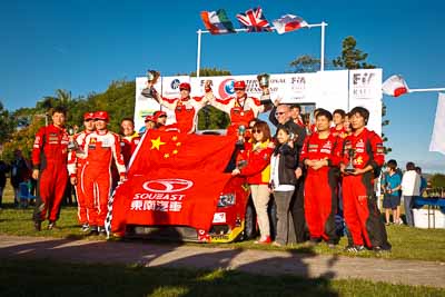 15-May-2011;APRC;Asia-Pacific-Rally-Championship;Australia;Fan-Fan;Hao-Yuan;Hongyu-Pan;IROQ;Ieuan-Thomas;Imbil;International-Rally-Of-Queensland;Junwei-Fang;Mark-Higgins;Mitsubishi-Lancer-Evolution-X;QLD;Queensland;Soueast-Motor-Kumho-Team;Sunshine-Coast;Topshot;afternoon;auto;celebration;group;motorsport;official-finish;podium;racing;wide-angle