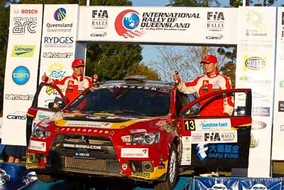 13;13;15-May-2011;APRC;Asia-Pacific-Rally-Championship;Australia;Hao-Yuan;Hongyu-Pan;IROQ;Imbil;International-Rally-Of-Queensland;Mitsubishi-Lancer-Evolution-X;QLD;Queensland;Soueast-Motor-Kumho-Team;Sunshine-Coast;auto;motorsport;podium;racing;telephoto