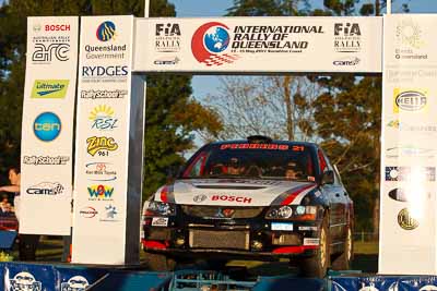 21;15-May-2011;21;ARC;Australia;Australian-Rally-Championship;IROQ;Imbil;International-Rally-Of-Queensland;Lee-Tierney;Mark-Pedder;Mitsubishi-Lancer-Evolution-IX;Pedders-Suspension;QLD;Queensland;Sunshine-Coast;auto;motorsport;podium;racing;telephoto