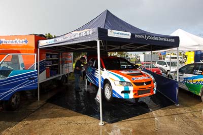 27;15-July-2011;27;APRC;Asia-Pacific-Rally-Championship;Glenn-Goldring;Glenn-Inkster;International-Rally-Of-Whangarei;Mitsubishi-Lancer-Evolution-IX;NZ;New-Zealand;Northland;Rally;Whangarei;auto;garage;motorsport;pre‒event;racing;service-park;wide-angle