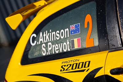 2;15-July-2011;2;APRC;Asia-Pacific-Rally-Championship;Chris-Atkinson;International-Rally-Of-Whangarei;NZ;New-Zealand;Northland;Proton-Motorsports;Proton-Satria-Neo-S2000;Rally;Stephane-Prevot;Whangarei;auto;garage;motorsport;pre‒event;racing;service-park;telephoto